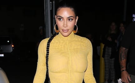 Kim Kardashian destila glamour con vestido amarillo ceñido