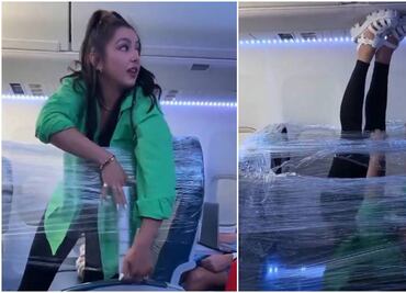 Video. Mujer envuelve asientos con plástico para aislarse en un avión