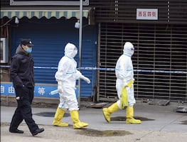 Mujer vendedora, el primer caso de Covid en la ciudad china de Wuhan