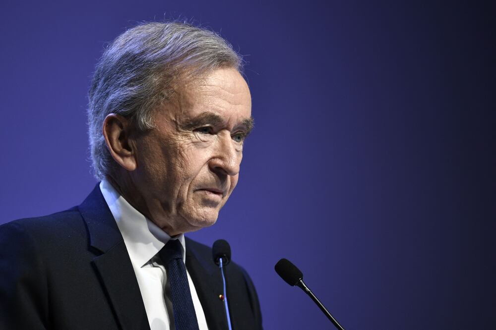 (FILES) World's top luxury group LVMH head Bernard Arnault presents the group's 2023 annual results in Paris, on January 25, 2024. The French president awarded the Grand Cross of the Legion of Honour in the evening of March 13, 2024, the CEO of French luxury giant LVMH, Bernard Arnault. (Photo by STEPHANE DE SAKUTIN / AFP)