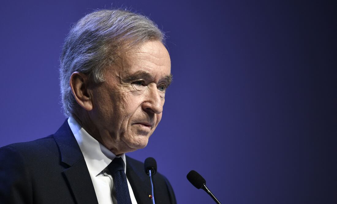 (FILES) World's top luxury group LVMH head Bernard Arnault presents the group's 2023 annual results in Paris, on January 25, 2024. The French president awarded the Grand Cross of the Legion of Honour in the evening of March 13, 2024, the CEO of  French luxury giant LVMH, Bernard Arnault. (Photo by STEPHANE DE SAKUTIN / AFP)