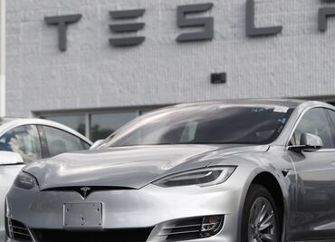 Tesla supera el billón de dls; Dow Jones y S&P cierran en récord