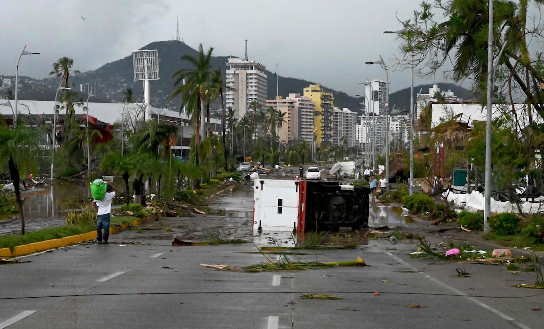 Huracán Otis (Photo by FRANCISCO ROBLES / AFP)