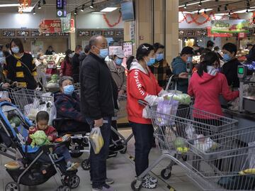 China llama a su población a hacerse de reservas de comida