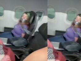 Inmovilizan a mujer con cinta por intentar abrir puerta de avión en pleno vuelo