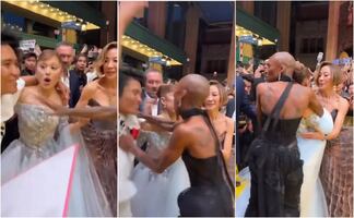 Caos en la alfombra roja: Ariana Grande es acorralada por un fan y Cynthia Erivo salta a defenderla. VIRAL