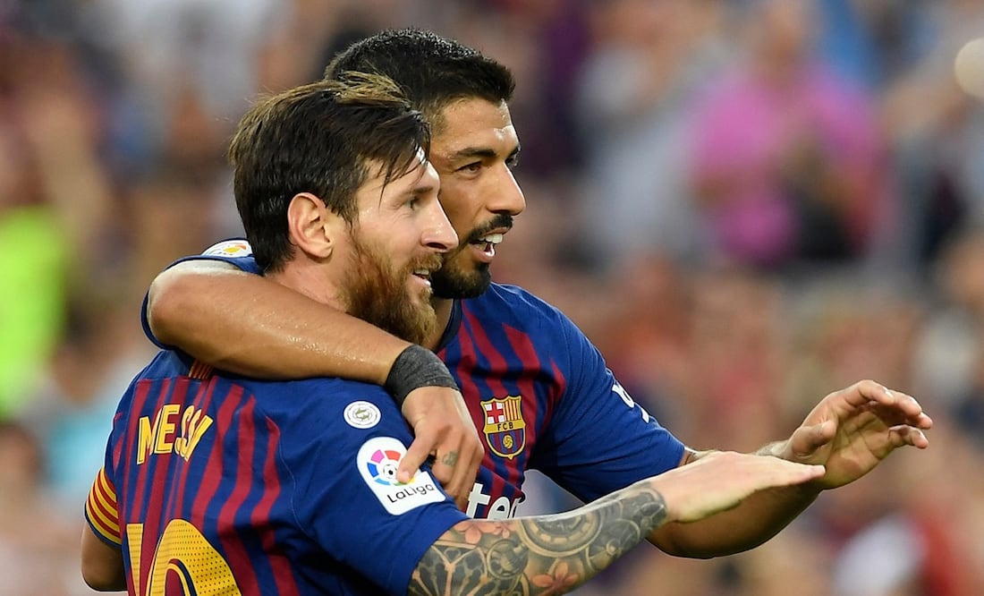 Luis Suárez y Lionel Messi/ (Photo by LLUIS GENE / AFP)