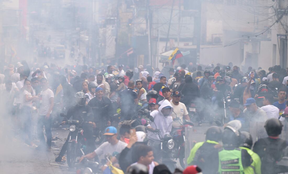 Cuatro muertos y cientos de detenidos en protestas contra Maduro en Venezuela(Photo by Yuri CORTEZ / AFP)