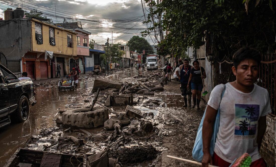 ¡Histórico! Suprema Corte y Senado se bajan el sueldo para ayudar a los damnificados por las lluvias en México (Photo by Hector Quintanar / AFP)