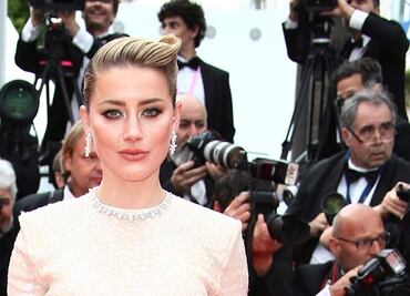 Amber Heard brilla con vestido de raja en Festival de Cannes