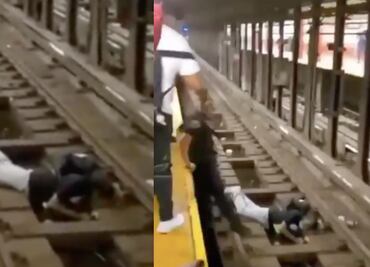 Policía salva a hombre de ser arrollado por el metro en Nueva York (video)