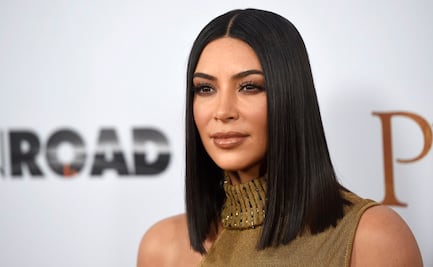 Kim Kardashian presume cinturita y marcadas curvas con catsuit negro