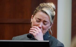 Amber Heard dice que quizo divorciarse de Johnny Depp porque temía por su vida