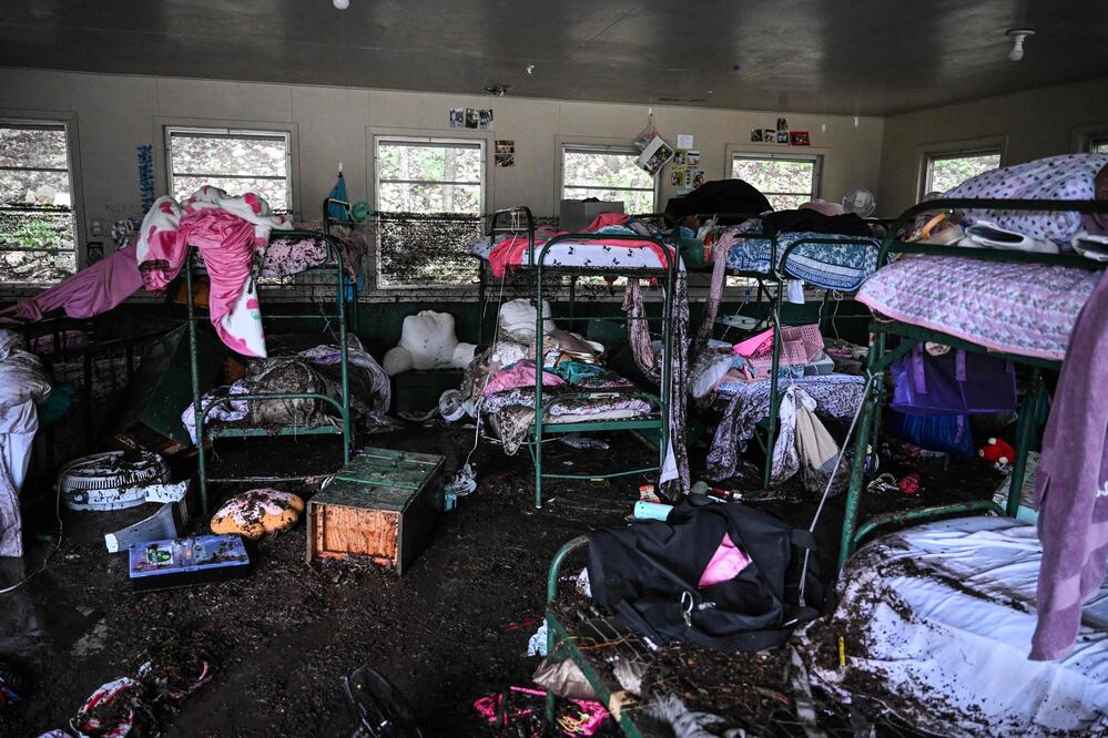 Campamento Mystic llora la pérdida de 27 niñas tras mortales inundaciones en Texas(Photo by RONALDO SCHEMIDT / AFP)