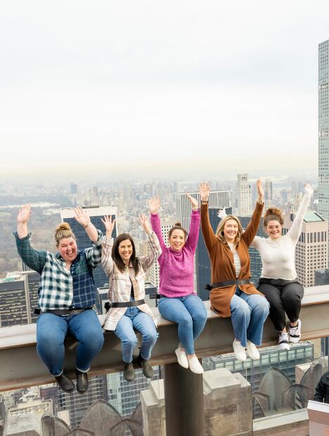 Visitors enjoy Rockefeller Center's new interactive experience "The Beam" at Top of the Rock Observation Deck. (Diane Bondareff/AP Images for Tishman Speyer)