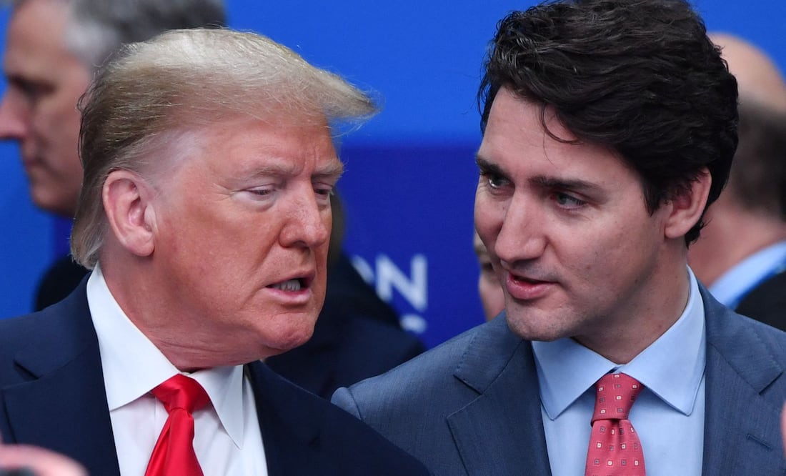 Trump propone a Trudeau integrar Canadá a Estados Unidos para evitar aranceles. (Photo by Nicholas Kamm / AFP)