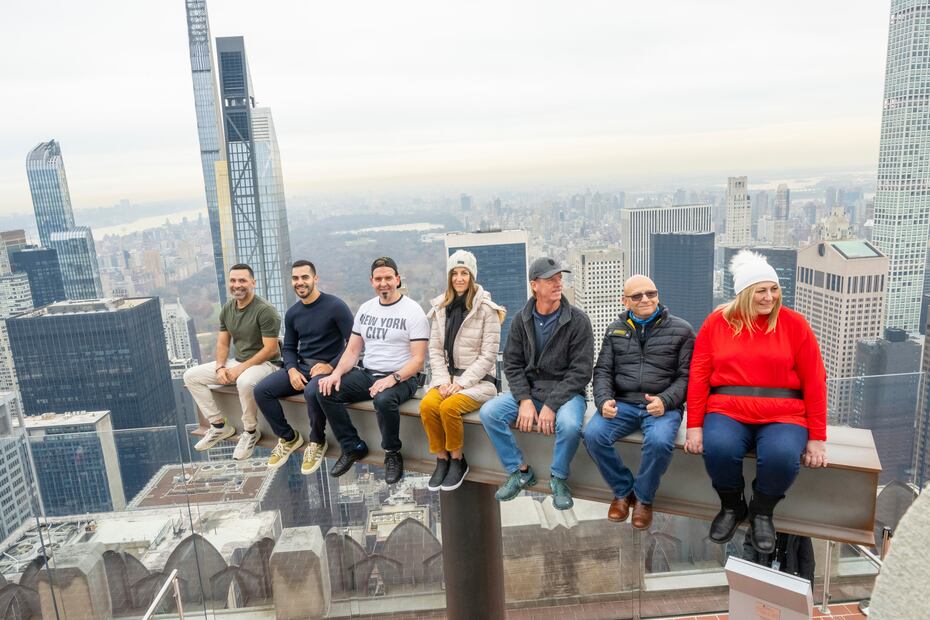 Visitors enjoy Rockefeller Center's new interactive experience "The Beam" at Top of the Rock Observation Deck. (Diane Bondareff/AP Images for Tishman Speyer)