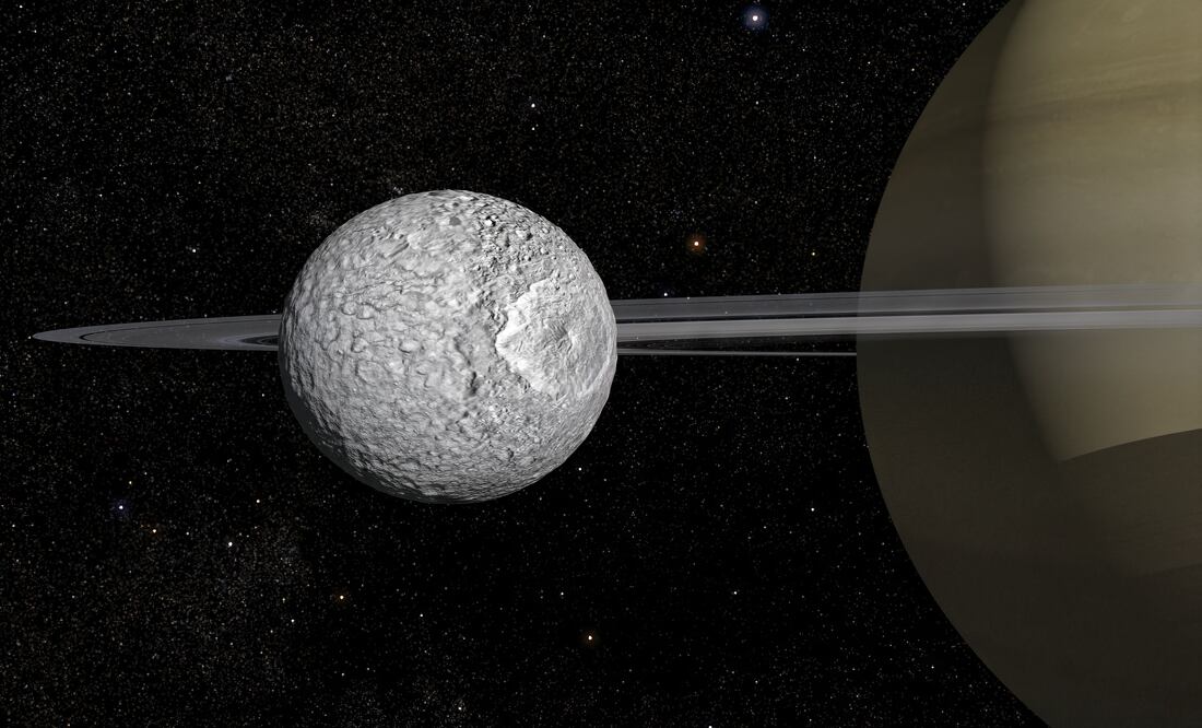 "¡Sorpresa en Saturno! La luna Mimas podría tener un océano recién descubierto y en evolución.  (Photo by Frederic Durillon / Animea Studio | Observatoire de Paris - PSL, IMCCE / AFP)